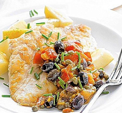 Flat chicken with tomatoes, olives and capers